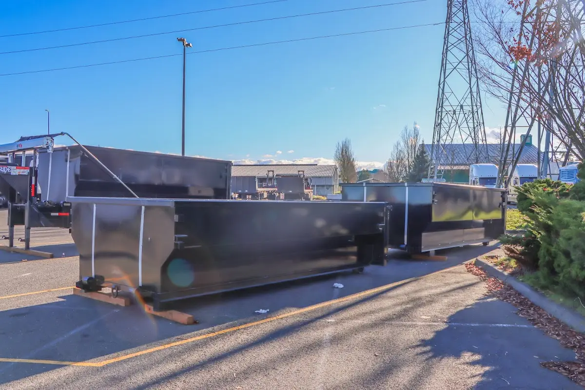 Roll-off dumpster ready for waste disposal at job site for Roofing Dumpster Rental in Eatontown